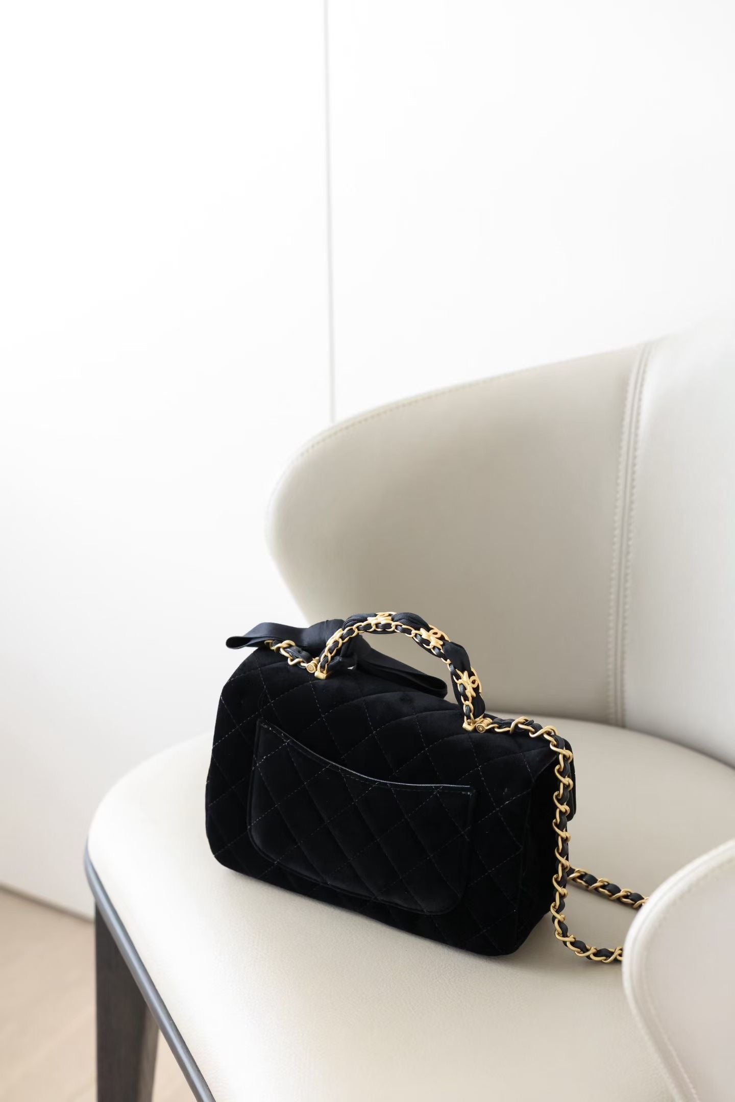CHANEL MINI FLAP BAG WITH BOW