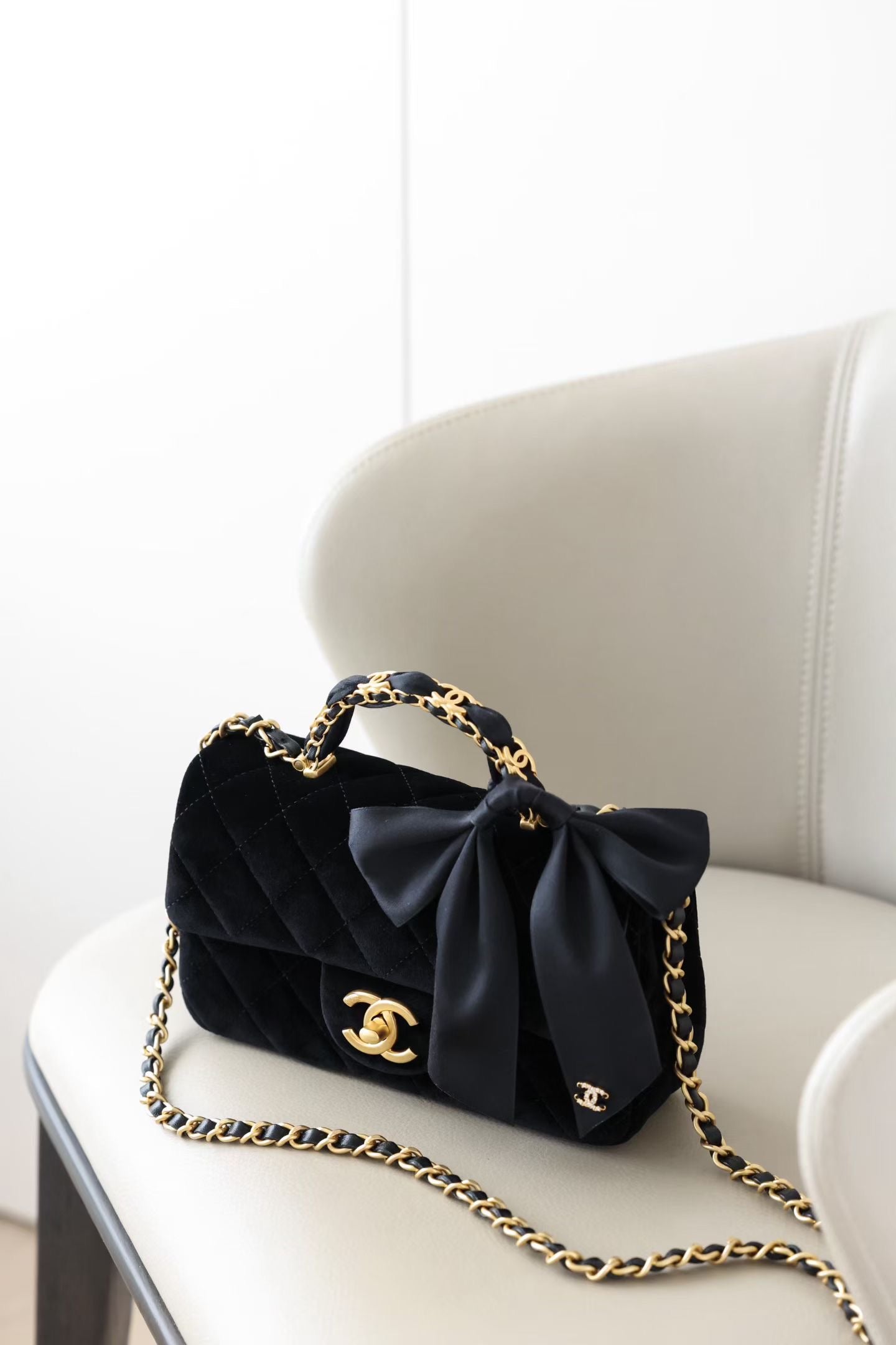 CHANEL MINI FLAP BAG WITH BOW